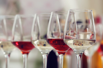 Wine glasses with red and white wine, closeup