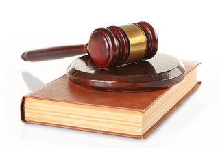 Gavel and book isolated on white