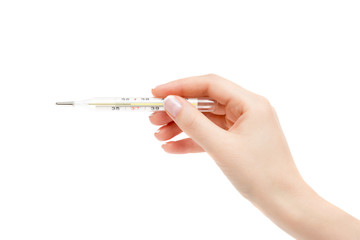 Female hand holds thermometer on a white background.