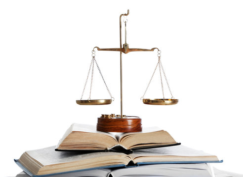 Wooden gavel with justice scales and open books on white background