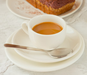 Coffee with cream and cake