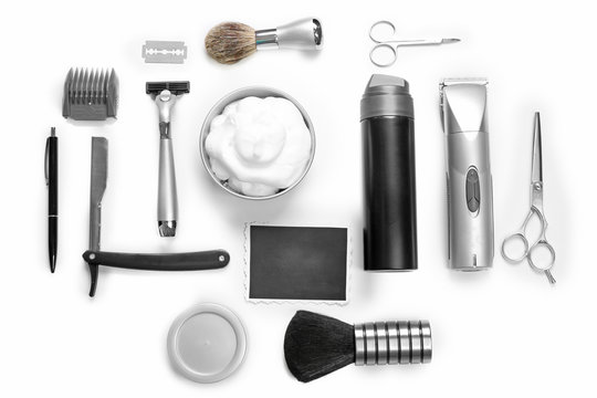 Black photo, shaving set with equipment, tools and foam, isolated on white