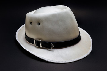 White cowboy hat isolated on black background