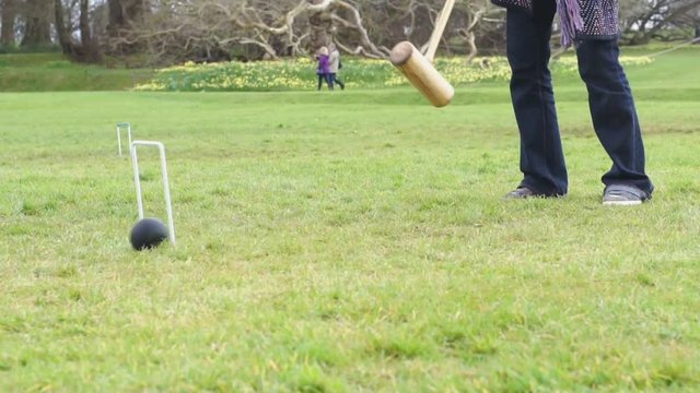Hitting a croquet ball