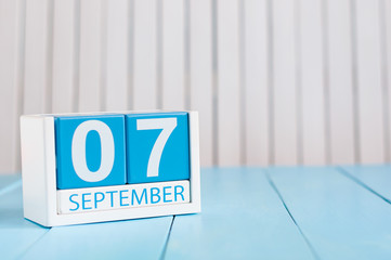 September 7th. Image of september 7 wooden color calendar on white background. Autumn day. Empty space for text