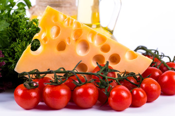 yellow cheese with fresh vegetables