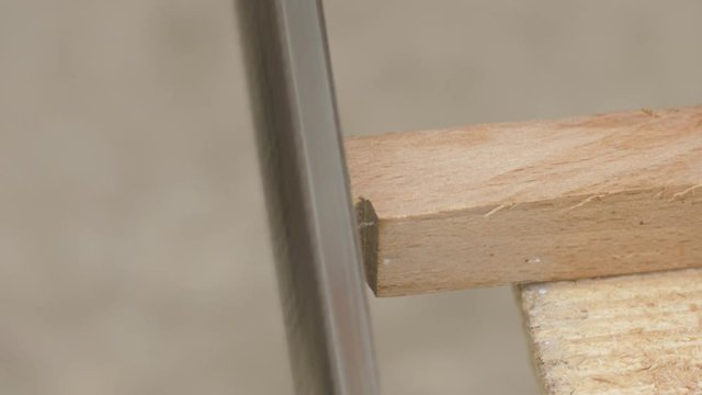 polishing of wooden plank using a rasp