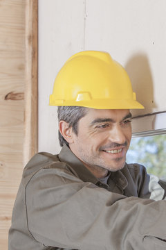 Protrait Construction Worker drilling