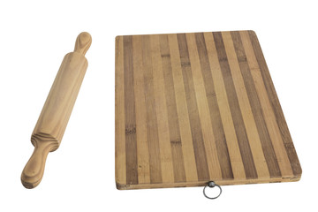 wooden rolling pin and cutting board isolated on white background