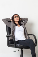 cool beautiful young corporate woman relaxing or expressing laziness