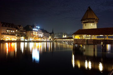 Fototapeta na wymiar Amazing Night photos of Chapel Bridge in City of Lucern, Canton of Lucerne, Switzerland