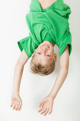 Upside down boy in green shirt © Jan H. Andersen