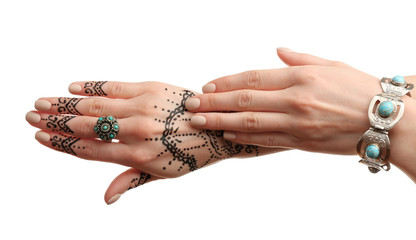 Henna tattoo on female hands isolated on white