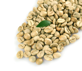 Green coffee beans on white background