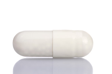 white drug capsule isolated on white background