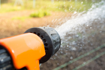 Closeup of hand held  sprinkler