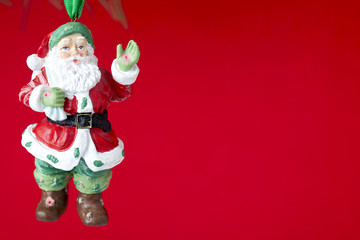 image of a santa claus statue gesturing.