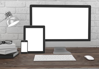 Fototapeta premium Responsive mockup screen. Monitor, tablet, phone on table in office. 3d rendering.