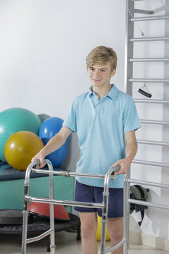 Rehabilitation of young boy walking