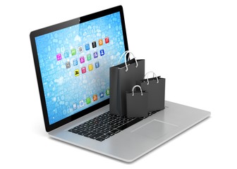 laptop and  shopping pags on white background. 3d rendering.