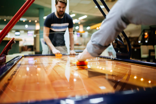 Air hockey is fun even for adults