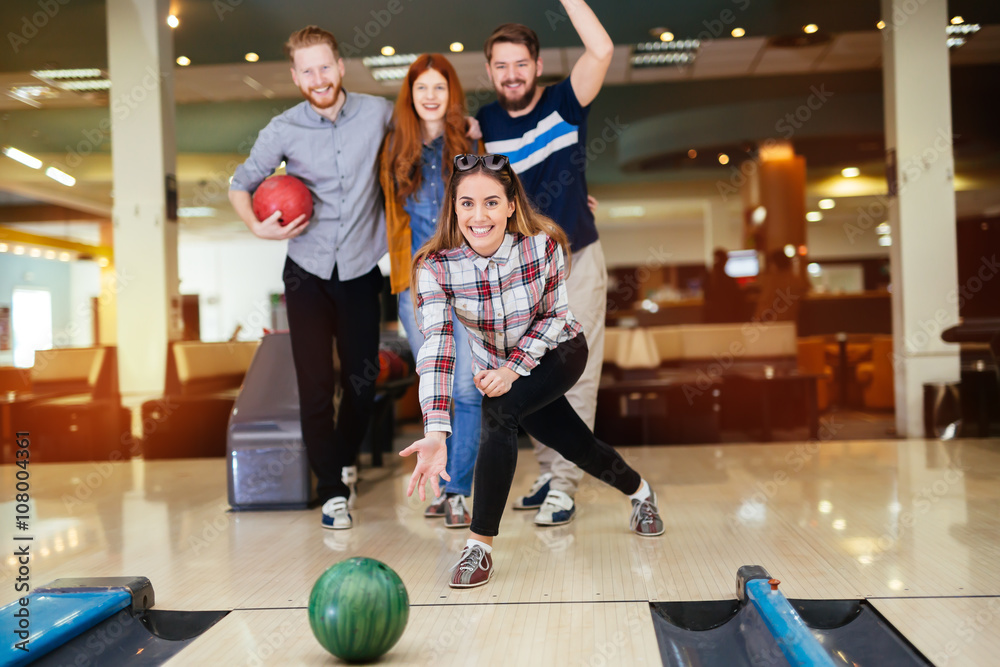 Wall mural friends enjoying bowling at club