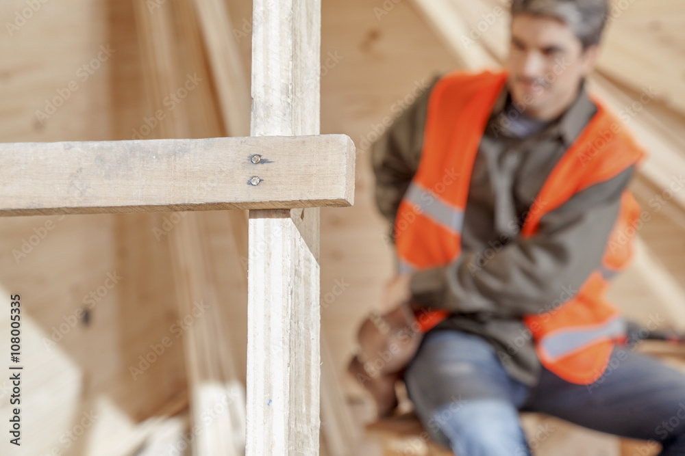 Poster Contractor operating a power tool