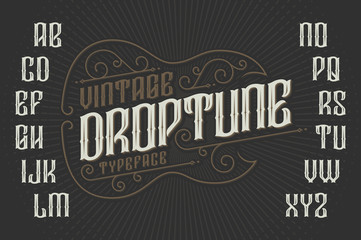 Retro font with decorative frame in shape of gothic guitar. Vintage elegant font.