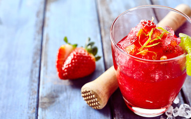 Strawberry slush drink with copy space on table
