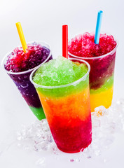 Frozen Rainbow Slush Drinks Chilling on Ice