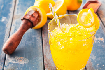 Delicious lemon ice drink in glass