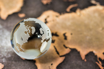 Crystal globe on world map