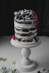 Decorated brown naked cake rustic style for weddings, birthdays and events
