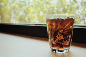Cola with ice cubes