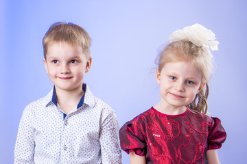 Portrait of cute little boy and girl