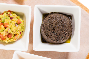 Tapenade of black olives as a appetizer.