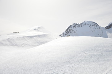 Winter snow covered mountain peaks in Europe