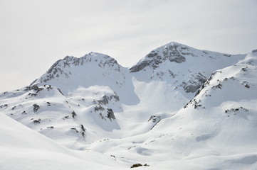 Winter snow covered mountain peaks in Europe