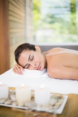 Obraz na płótnie Canvas Woman relaxing on massage table