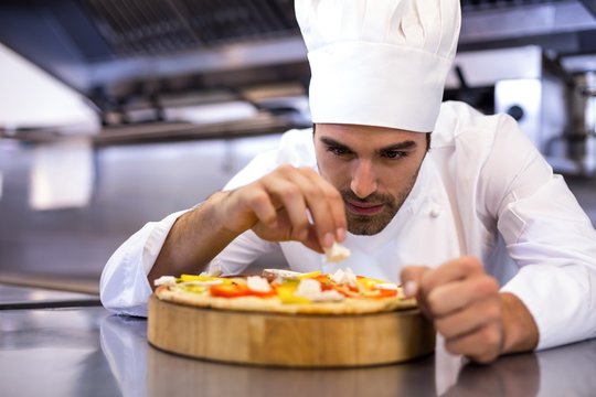 Pizza chef making pizza