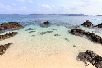 Fototapeta na wymiar Sea beach with the rocks and clear water