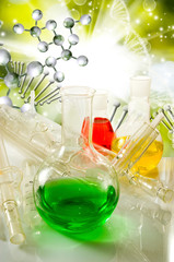 Image of laboratory glassware on DNA strand background  close-up