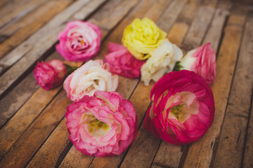 eustoma lying on a wooden board  rustic style