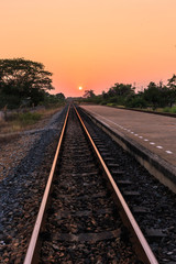 Fototapeta na wymiar Sunset over railroad