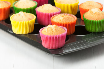 Homemade Colorful Plain Cupcakes On Baking Tray.