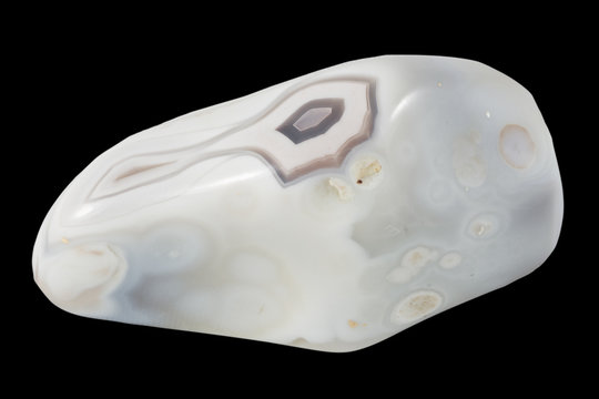 agate stone macro, isolated on black background