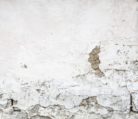 Cracked surface of concrete wall.