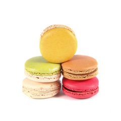 Tasty colorful macaroon on white background