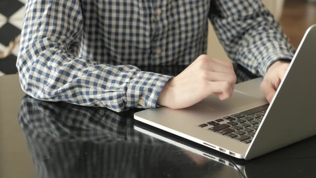 Man Hands Typing on a Computer Keyboard.