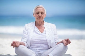 Fototapeta na wymiar Beautiful mature woman meditating